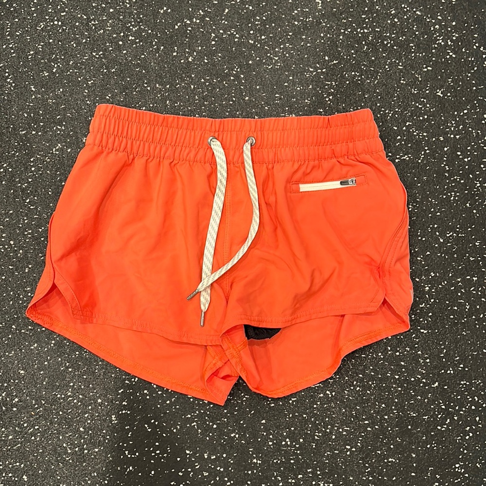 COPY - Coral orange Vuori shorts. Size woman’s small.